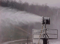A fan gun converts water to snow on the slopes of Ski Roundtop.