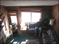 Author Matt Lees enjoys sun streaming in the windows of a Wabasso condo at Snowshoe.