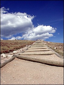 t may look like a heavenly  hike, but with an elevation above 12,000 feet, you'll be stopping every few steps to catch your breath. The Alpine Ridge Trail  is short in distance but breathtaking in more than one way. (The  panorama at the top of this article - created by joining seven images - was taken at top of this trail.)