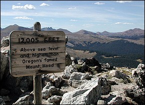 A trailtop sign points out that Rocky  Mountain National Park's mountains are bigger than Oregon's mountains.  (Take that, you Oregonians.) Of course, you can ski on Mt. Hood  year-round..
