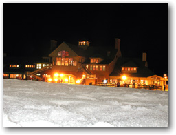 With a warm glow, Whitetail's Deer Valley-inspired base lodge beckons skiers with a free ski check and the smell of hamburgers  grilling.