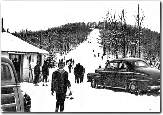 This photo shows the 550-foot ski slope at Chestnut Ridge, a small ski resort located near Coopers Rock State Forest in West Virginia from 1951 through 1973.  During the season this photo was taken, the ski slope was open for 40 days of skiing.